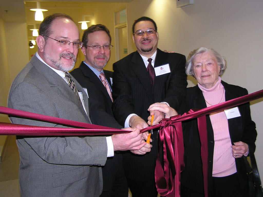 CFH leaders and partners cut the ribbin at the Grand opening of Susan's Place