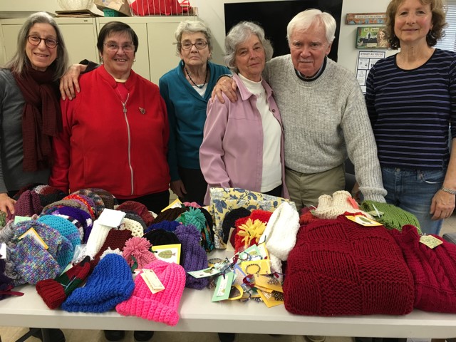 Senior Center residents posing with donations.